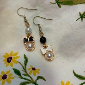 Mismatched White and Black Earrings with Bows