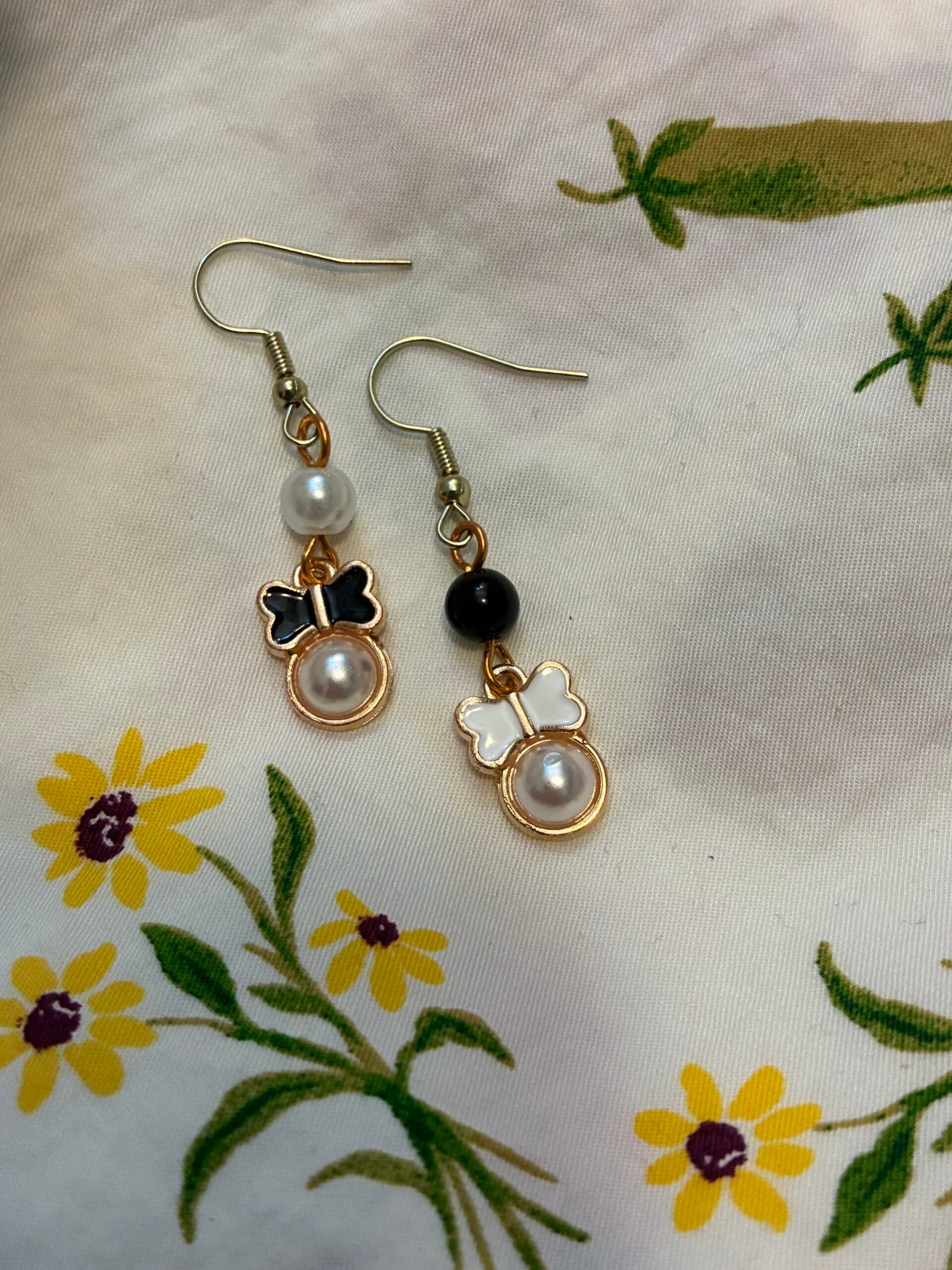 Mismatched White and Black Earrings with Bows